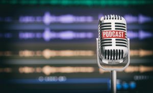 Home Podcast Studio. Microphone with a podcast icon on a table